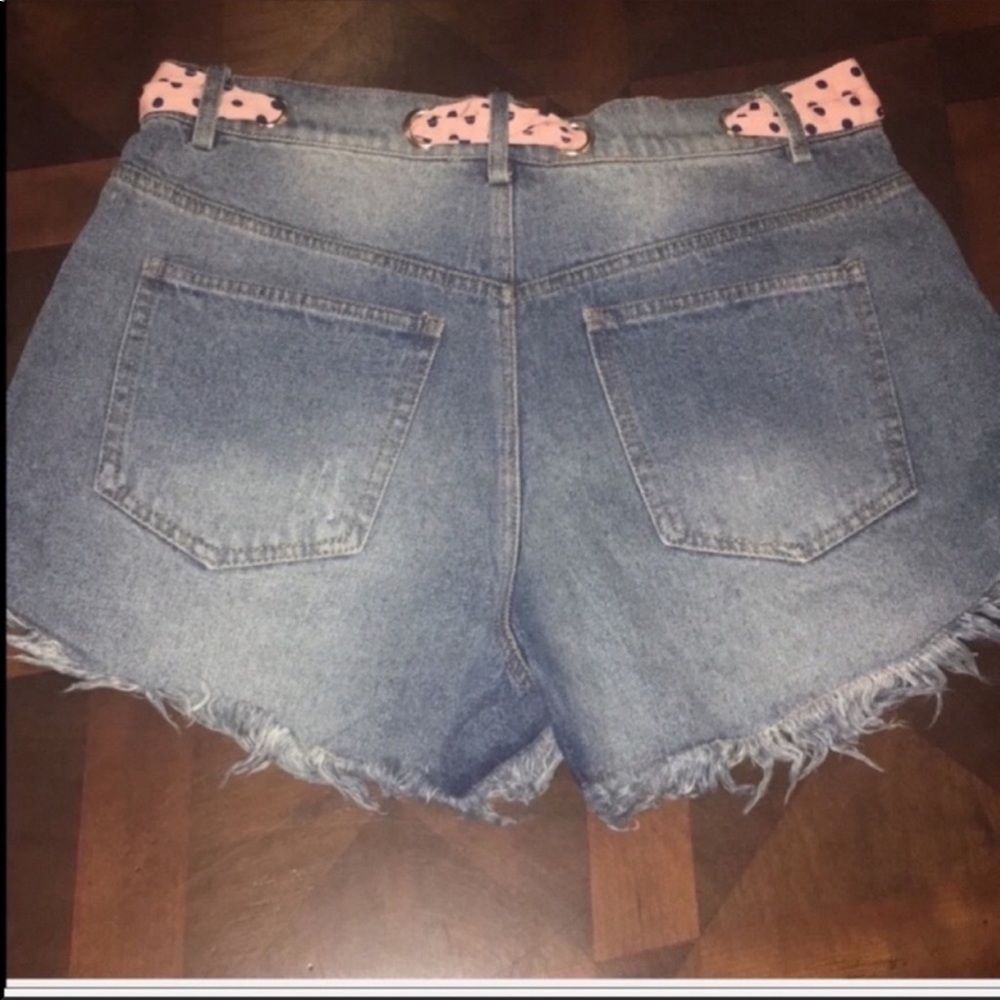 Distressed Denim Shorts with Polka Dot Bow - Picture 3 of 4